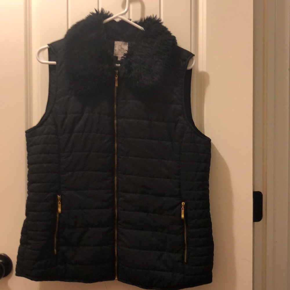 Dress Barn. Woman’s faux fur collar down vest.